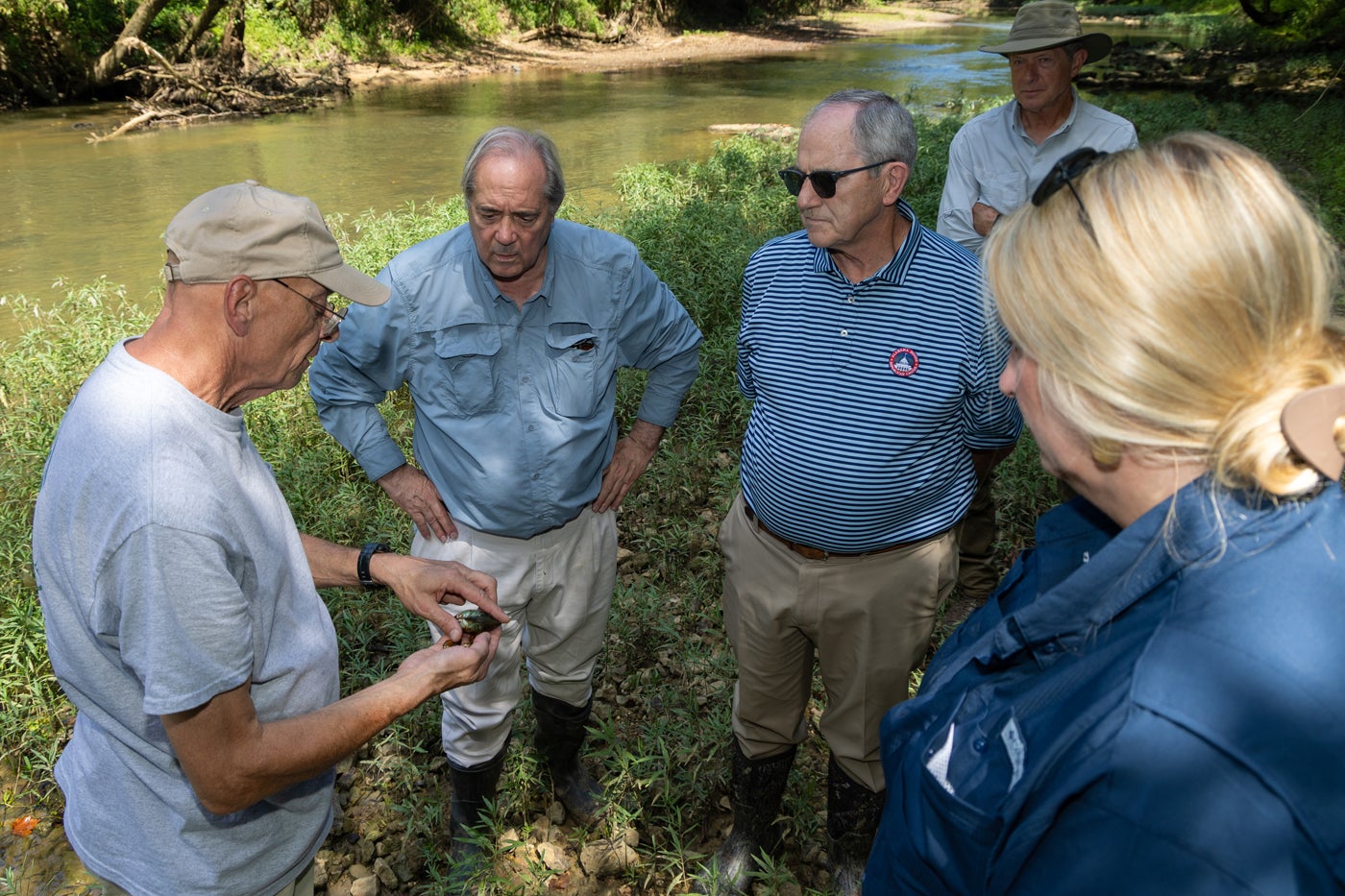 AABC Director Dr. Paul Johnson (left) explains the importance of mussels to aquatic ecosystem to Sen. Steve Livingston, Rep. Mike Kirkland and ADCNR Deputy Commissioner Charlanna Skaggs.