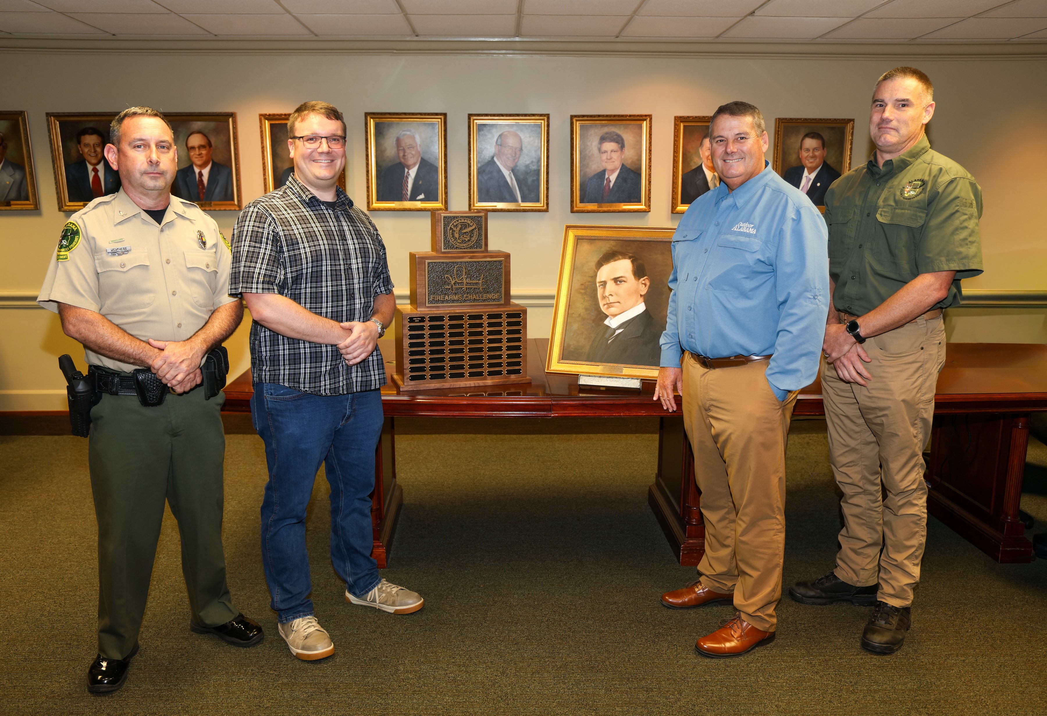 Winner of the first pistol challenge with ADCNR leadership team. 